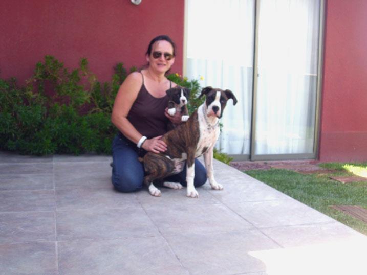 entrenadora junto a una dopla de boxer